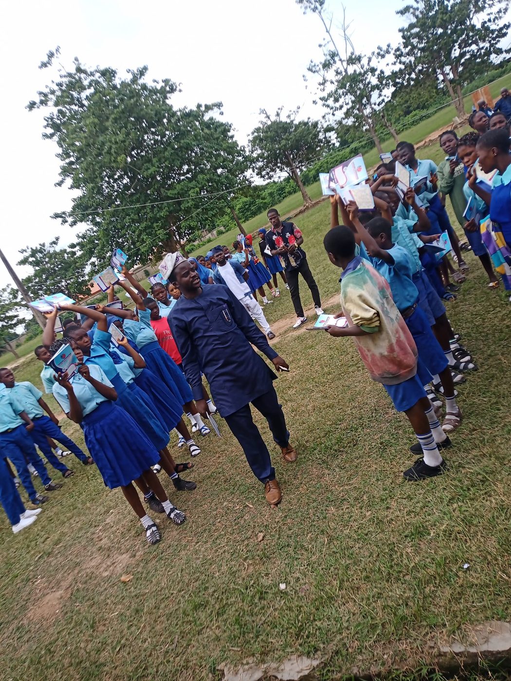 Earlier notebook distribution at Oyinlola Comprehensive High School, Okuku
